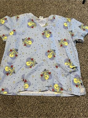 Warner Bros. Light Blue Tweety Scrub Top with Yellow & Red Accents